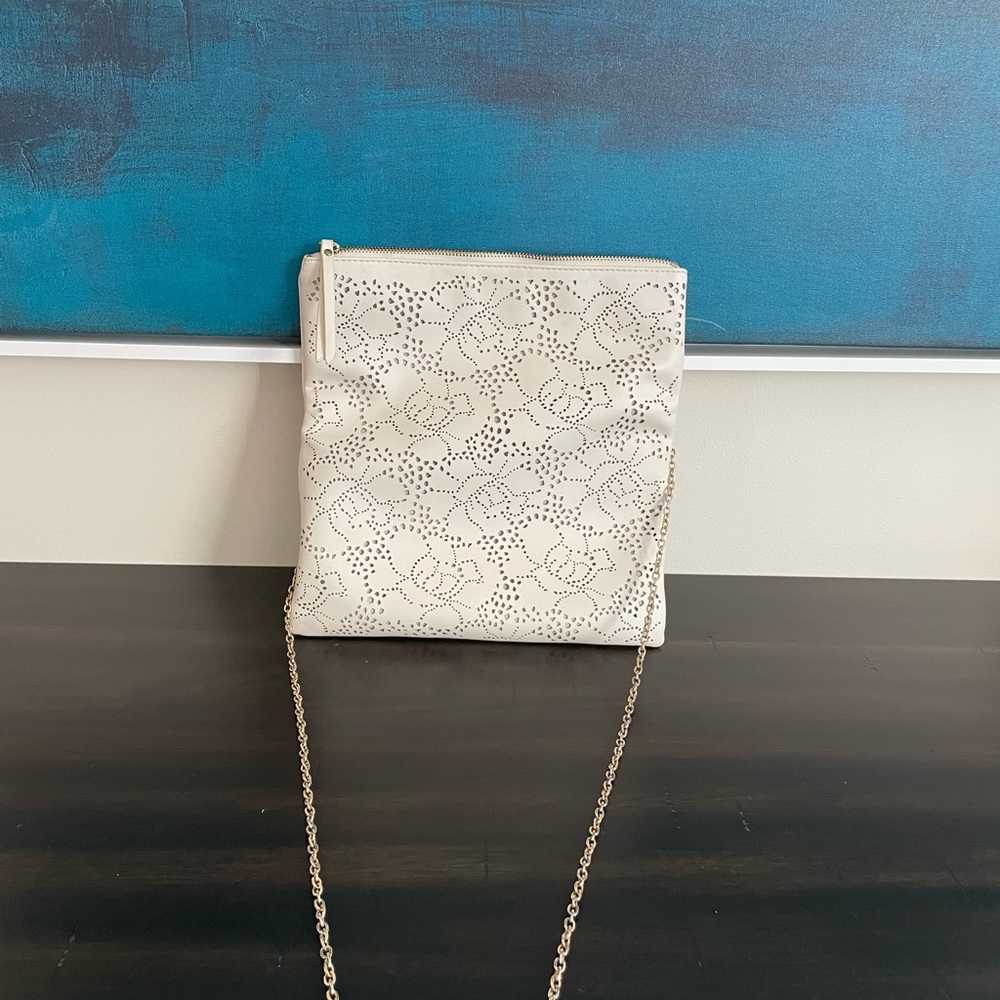 Urbane expressions Locket cross body clutch